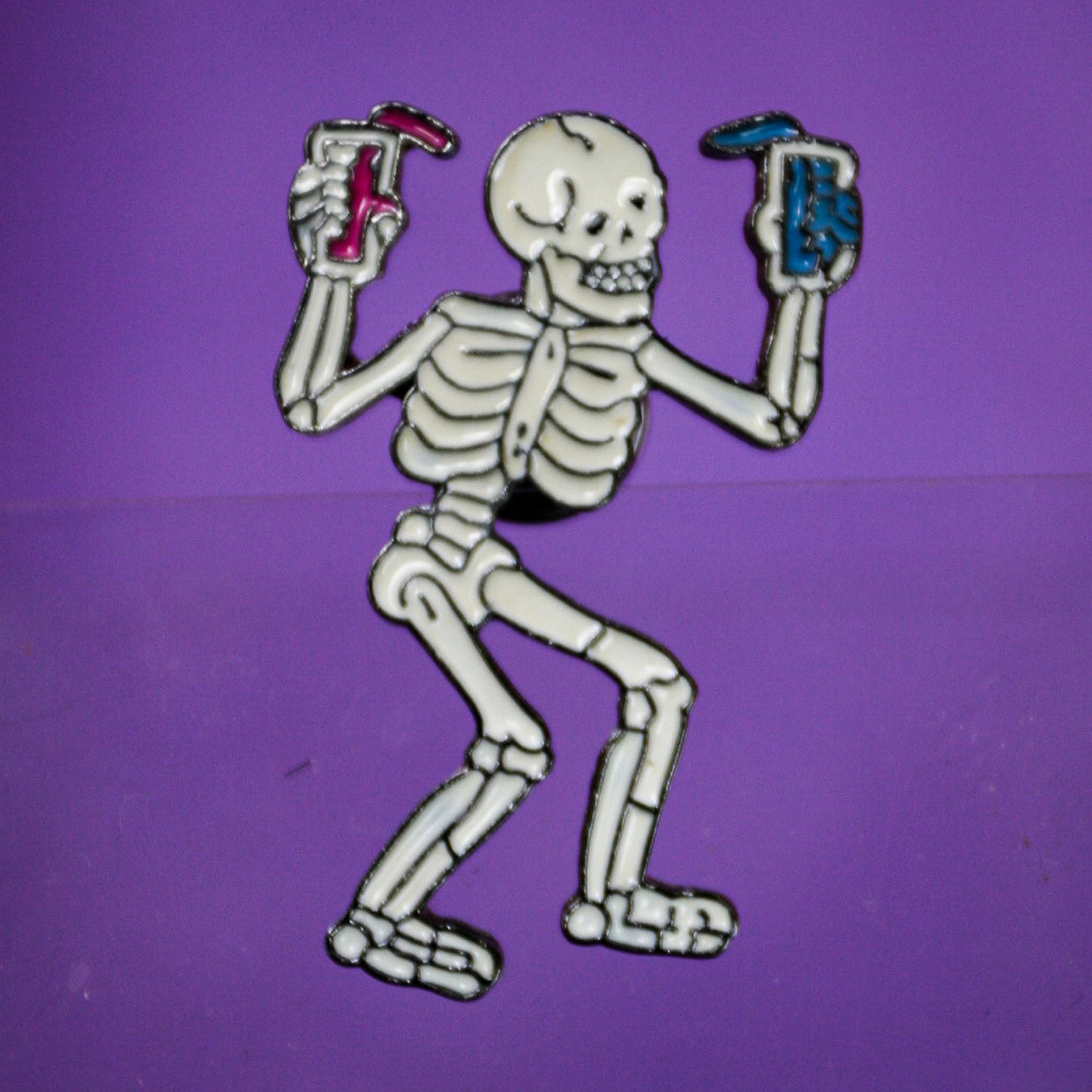 Double Fisting Skeleton Enamel Pin